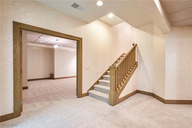 Discover this stunning, one-of-a-kind custom home in the quiet on Brookside Country Club in Ohio - for sale on GolfHomes.com, golf home, golf lot