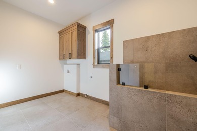 Overlooking the tranquil setting of Preservation Park, this on Sunriver Caldera Springs Golf Course in Oregon - for sale on GolfHomes.com, golf home, golf lot