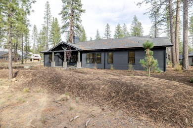 Overlooking the tranquil setting of Preservation Park, this on Sunriver Caldera Springs Golf Course in Oregon - for sale on GolfHomes.com, golf home, golf lot