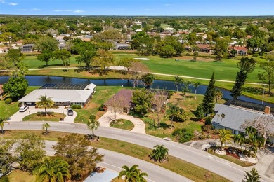 Oversized lot (nearly  1/2  acre) with stunning views of the on Palm Aire Country Club of Sarasota in Florida - for sale on GolfHomes.com, golf home, golf lot