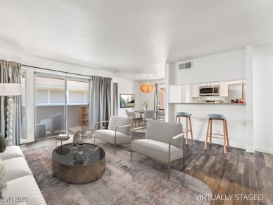 Meticulously maintained and beautifully remodeled second-story on Las Vegas Country Club in Nevada - for sale on GolfHomes.com, golf home, golf lot
