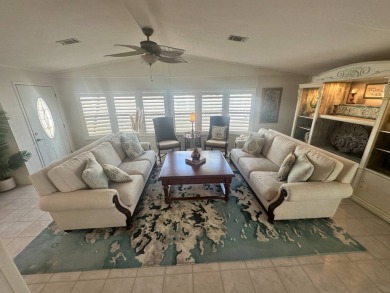 Lot Rent is $1342.00 monthly  Another showcase home in the on Del Tura Golf and Country Club in Florida - for sale on GolfHomes.com, golf home, golf lot