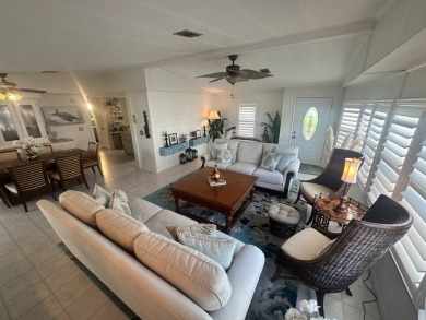 Lot Rent is $1342.00 monthly  Another showcase home in the on Del Tura Golf and Country Club in Florida - for sale on GolfHomes.com, golf home, golf lot
