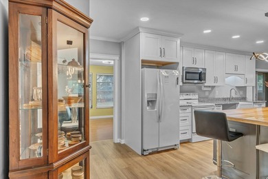 Mid-Century Modern-influenced CBS home in Sandpiper Bay, built on Club Med Sandpiper in Florida - for sale on GolfHomes.com, golf home, golf lot