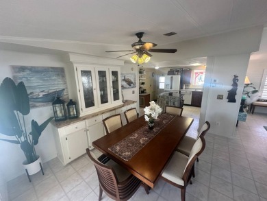 Lot Rent is $1342.00 monthly  Another showcase home in the on Del Tura Golf and Country Club in Florida - for sale on GolfHomes.com, golf home, golf lot