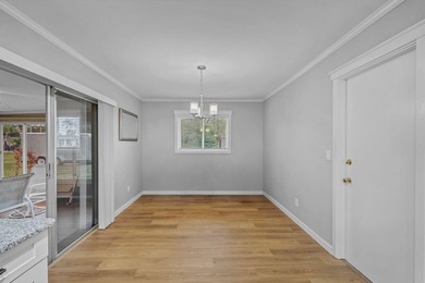 Mid-Century Modern-influenced CBS home in Sandpiper Bay, built on Club Med Sandpiper in Florida - for sale on GolfHomes.com, golf home, golf lot