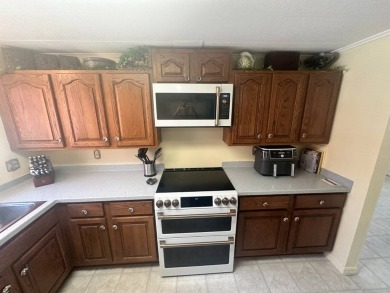 Lot Rent is $1342.00 monthly  Another showcase home in the on Del Tura Golf and Country Club in Florida - for sale on GolfHomes.com, golf home, golf lot