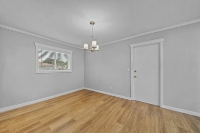 Mid-Century Modern-influenced CBS home in Sandpiper Bay, built on Club Med Sandpiper in Florida - for sale on GolfHomes.com, golf home, golf lot