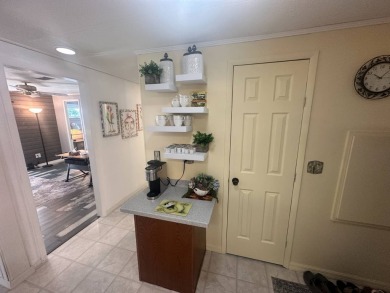 Lot Rent is $1342.00 monthly  Another showcase home in the on Del Tura Golf and Country Club in Florida - for sale on GolfHomes.com, golf home, golf lot