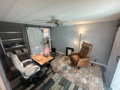 Lot Rent is $1342.00 monthly  Another showcase home in the on Del Tura Golf and Country Club in Florida - for sale on GolfHomes.com, golf home, golf lot