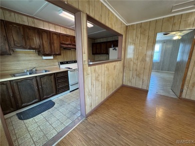 MUST SEE!! Charming and Well Taken Care Of Site-Built Home on on Cerbat Cliffs Golf Course in Arizona - for sale on GolfHomes.com, golf home, golf lot