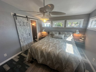 Lot Rent is $1342.00 monthly  Another showcase home in the on Del Tura Golf and Country Club in Florida - for sale on GolfHomes.com, golf home, golf lot