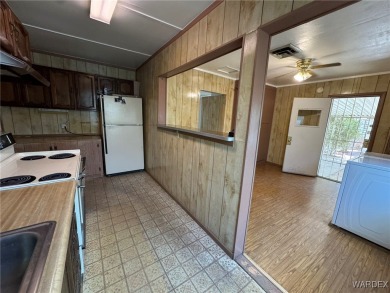 MUST SEE!! Charming and Well Taken Care Of Site-Built Home on on Cerbat Cliffs Golf Course in Arizona - for sale on GolfHomes.com, golf home, golf lot