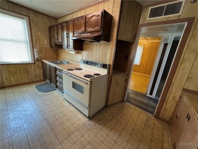 MUST SEE!! Charming and Well Taken Care Of Site-Built Home on on Cerbat Cliffs Golf Course in Arizona - for sale on GolfHomes.com, golf home, golf lot