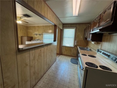 MUST SEE!! Charming and Well Taken Care Of Site-Built Home on on Cerbat Cliffs Golf Course in Arizona - for sale on GolfHomes.com, golf home, golf lot