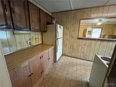 MUST SEE!! Charming and Well Taken Care Of Site-Built Home on on Cerbat Cliffs Golf Course in Arizona - for sale on GolfHomes.com, golf home, golf lot