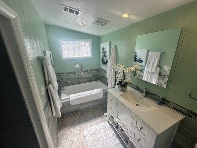 Lot Rent is $1342.00 monthly  Another showcase home in the on Del Tura Golf and Country Club in Florida - for sale on GolfHomes.com, golf home, golf lot