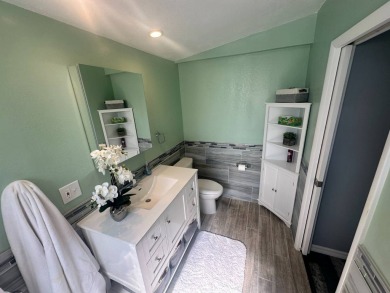 Lot Rent is $1342.00 monthly  Another showcase home in the on Del Tura Golf and Country Club in Florida - for sale on GolfHomes.com, golf home, golf lot