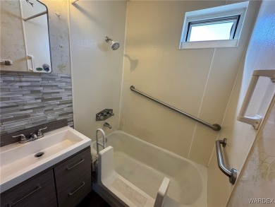 MUST SEE!! Charming and Well Taken Care Of Site-Built Home on on Cerbat Cliffs Golf Course in Arizona - for sale on GolfHomes.com, golf home, golf lot