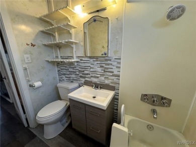 MUST SEE!! Charming and Well Taken Care Of Site-Built Home on on Cerbat Cliffs Golf Course in Arizona - for sale on GolfHomes.com, golf home, golf lot