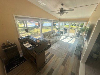 Lot Rent is $1342.00 monthly  Another showcase home in the on Del Tura Golf and Country Club in Florida - for sale on GolfHomes.com, golf home, golf lot