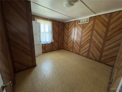 MUST SEE!! Charming and Well Taken Care Of Site-Built Home on on Cerbat Cliffs Golf Course in Arizona - for sale on GolfHomes.com, golf home, golf lot