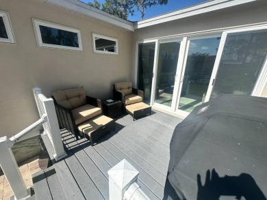 Lot Rent is $1342.00 monthly  Another showcase home in the on Del Tura Golf and Country Club in Florida - for sale on GolfHomes.com, golf home, golf lot