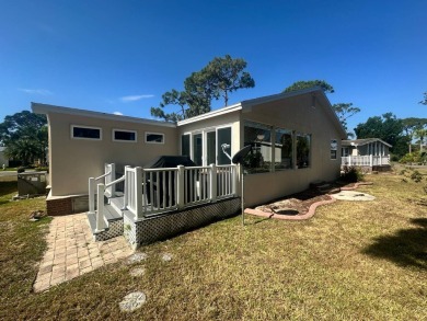 Lot Rent is $1342.00 monthly  Another showcase home in the on Del Tura Golf and Country Club in Florida - for sale on GolfHomes.com, golf home, golf lot