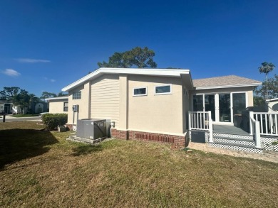 Lot Rent is $1342.00 monthly  Another showcase home in the on Del Tura Golf and Country Club in Florida - for sale on GolfHomes.com, golf home, golf lot