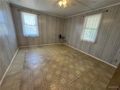 MUST SEE!! Charming and Well Taken Care Of Site-Built Home on on Cerbat Cliffs Golf Course in Arizona - for sale on GolfHomes.com, golf home, golf lot