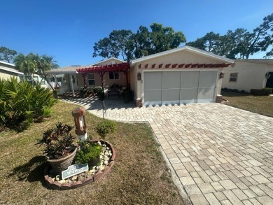 Lot Rent is $1342.00 monthly  Another showcase home in the on Del Tura Golf and Country Club in Florida - for sale on GolfHomes.com, golf home, golf lot