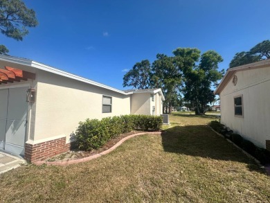 Lot Rent is $1342.00 monthly  Another showcase home in the on Del Tura Golf and Country Club in Florida - for sale on GolfHomes.com, golf home, golf lot