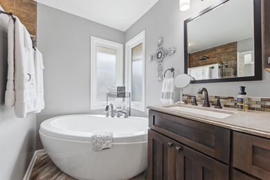 Spectacular, totally updated Reflection Ridge ranch with a on Reflection Ridge Golf Club in Kansas - for sale on GolfHomes.com, golf home, golf lot