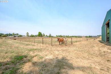 Situated on just under 5 acres of picturesque land, this income on Arrowhead Golf Club in Oregon - for sale on GolfHomes.com, golf home, golf lot