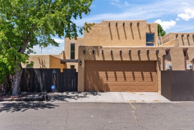 Welcome to your future home in the enchanting Villa Encantada! on Arroyo Del Oso Golf Course in New Mexico - for sale on GolfHomes.com, golf home, golf lot