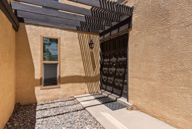 Welcome to your future home in the enchanting Villa Encantada! on Arroyo Del Oso Golf Course in New Mexico - for sale on GolfHomes.com, golf home, golf lot