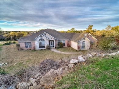 Acreage? YUP! Home is nestled on a cul de sac with over an acre on Eagle Mountain Country Club  in Texas - for sale on GolfHomes.com, golf home, golf lot