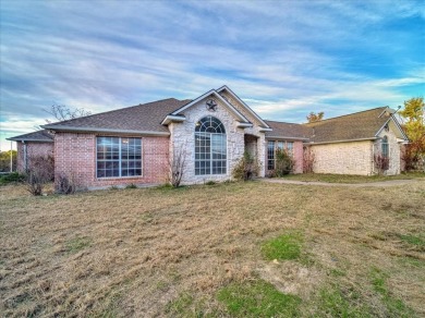 Acreage? YUP! Home is nestled on a cul de sac with over an acre on Eagle Mountain Country Club  in Texas - for sale on GolfHomes.com, golf home, golf lot