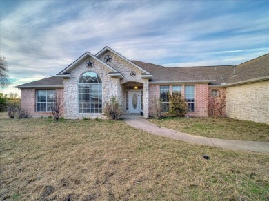 Acreage? YUP! Home is nestled on a cul de sac with over an acre on Eagle Mountain Country Club  in Texas - for sale on GolfHomes.com, golf home, golf lot