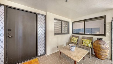 Step into coastal elegance in this fully renovated three-bedroom on Longboat Key Golf Club Resort in Florida - for sale on GolfHomes.com, golf home, golf lot