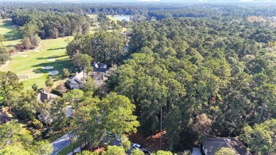 Design your dream home on this spacious corner wooded lot in the on Berkeley Hall Golf Club in South Carolina - for sale on GolfHomes.com, golf home, golf lot