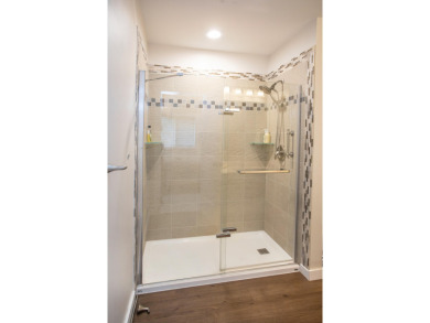 Incredible and updated Trapper Woods condo, nestled in the on Canadian Lakes Country Club-The Pines Course in Michigan - for sale on GolfHomes.com, golf home, golf lot