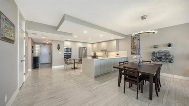 Step into coastal elegance in this fully renovated three-bedroom on Longboat Key Golf Club Resort in Florida - for sale on GolfHomes.com, golf home, golf lot
