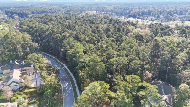 Design your dream home on this spacious corner wooded lot in the on Berkeley Hall Golf Club in South Carolina - for sale on GolfHomes.com, golf home, golf lot