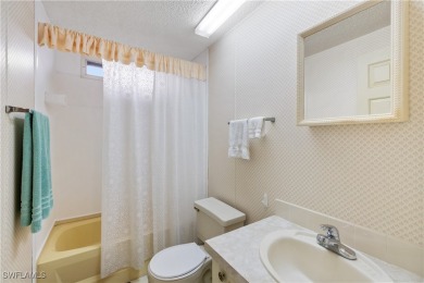 Your slice of paradise awaits with this 1989 2/2 Doublewide on Heron Creek Golf and Country Club in Florida - for sale on GolfHomes.com, golf home, golf lot