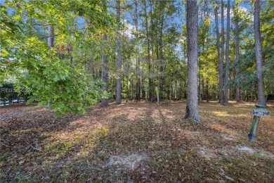 Design your dream home on this spacious corner wooded lot in the on Berkeley Hall Golf Club in South Carolina - for sale on GolfHomes.com, golf home, golf lot