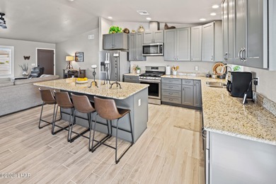 Welcome home to 2850 Edgewood Drive, a thoughtfully updated on London Bridge Golf Course in Arizona - for sale on GolfHomes.com, golf home, golf lot