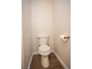 Incredible and updated Trapper Woods condo, nestled in the on Canadian Lakes Country Club-The Pines Course in Michigan - for sale on GolfHomes.com, golf home, golf lot