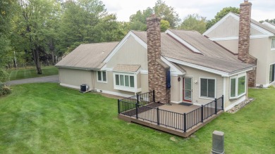 Incredible and updated Trapper Woods condo, nestled in the on Canadian Lakes Country Club-The Pines Course in Michigan - for sale on GolfHomes.com, golf home, golf lot