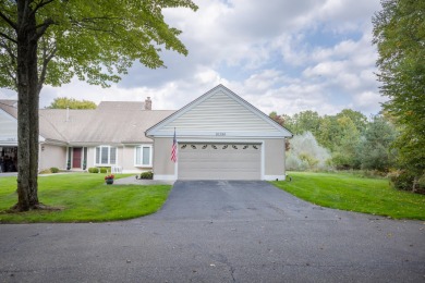 Incredible and updated Trapper Woods condo, nestled in the on Canadian Lakes Country Club-The Pines Course in Michigan - for sale on GolfHomes.com, golf home, golf lot